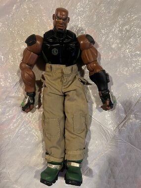 Action Hero Figure with Brown Skin and Green Boots - Learning Toy